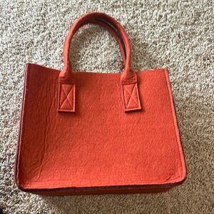 Fun orange felt structure purse from Punctuate